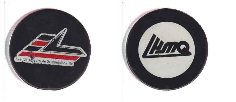 1985-93 IG2 IN GLAS CO DRUMONDVILLE VOLTIGERS GAME PUCK photo 1985-93 IG2 IN GLAS CO DRUMONDVILLE VOLTIGERS GAME PUCK photo