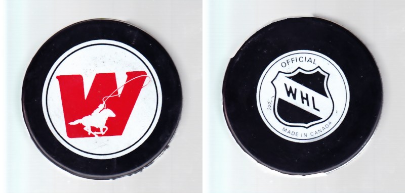 1983-86 WHL GDR CALGARY WRANGLERS GAME PUCK photo 1983-86 WHL GDR CALGARY WRANGLERS GAME PUCK photo