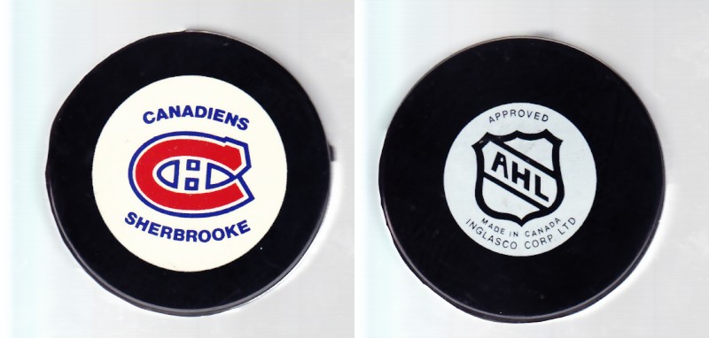 1986-93 AHL IN GLAS CO SHERBROOKE CANADIENS GAME PUCK photo 1986-93 AHL IN GLAS CO SHERBROOKE CANADIENS GAME PUCK photo