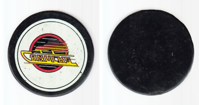 1980-87 NHL VICEROY VANCOUVER CANUCKS PUCK photo 1980-87 NHL VICEROY VANCOUVER CANUCKS PUCK photo