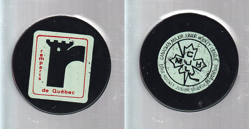1973-77 C22 QUEBEC REMPARTS GAME PUCK photo 1973-77 C22 QUEBEC REMPARTS GAME PUCK photo