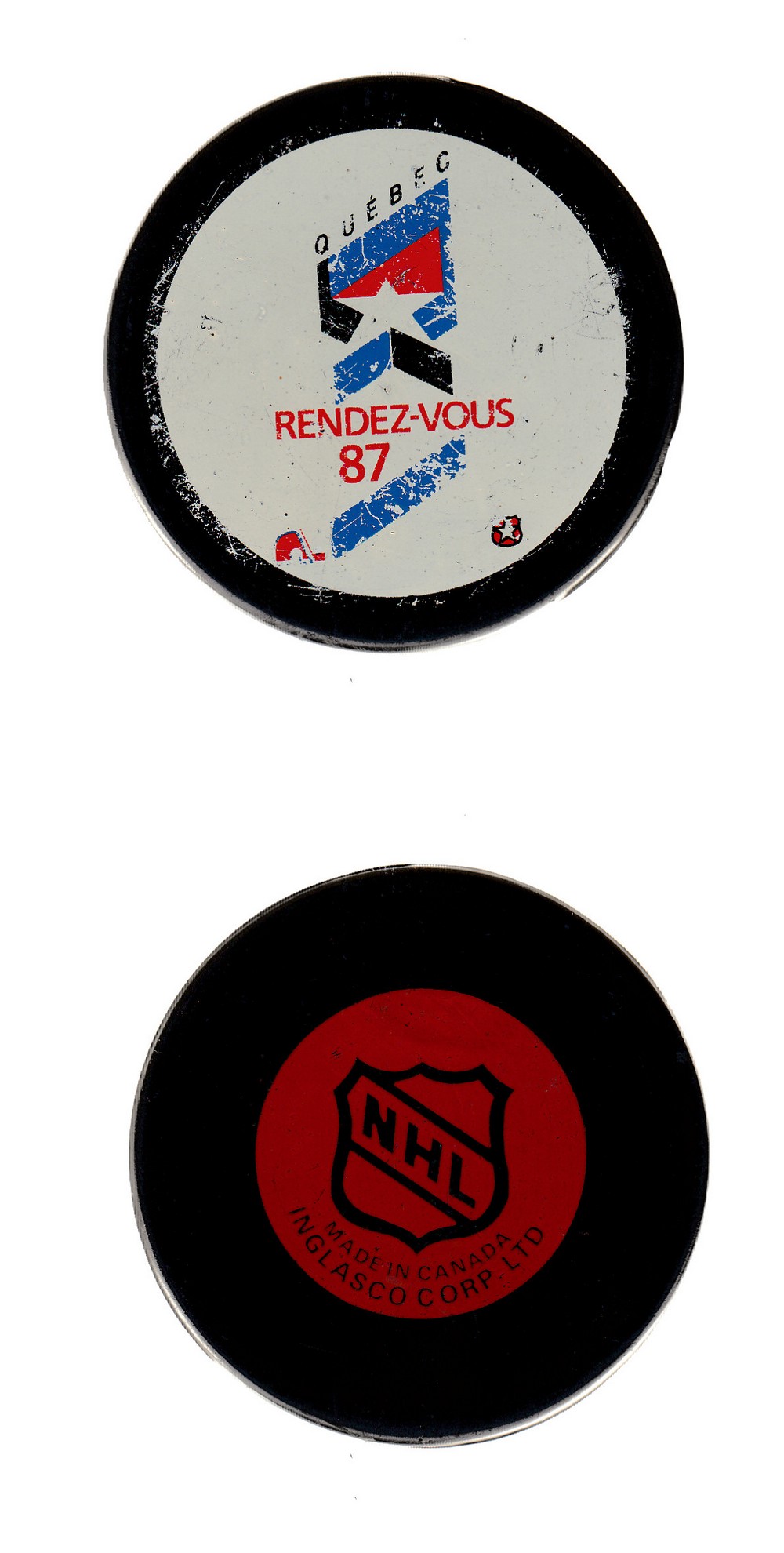 1985-87 IN GLAS CO QUEBEC RENDEZ-VOUS GAME PUCK photo 1985-87 IN GLAS CO QUEBEC RENDEZ-VOUS GAME PUCK photo