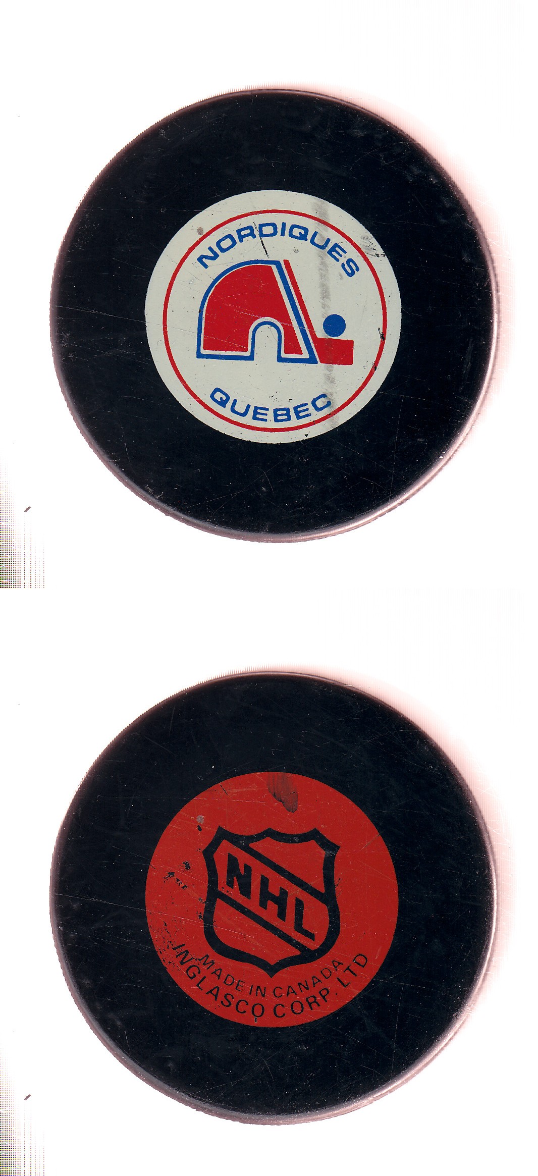 1985-92 IN GLAS CO QUEBEC NORDIQUES GAME PUCK photo 1985-92 IN GLAS CO QUEBEC NORDIQUES GAME PUCK photo